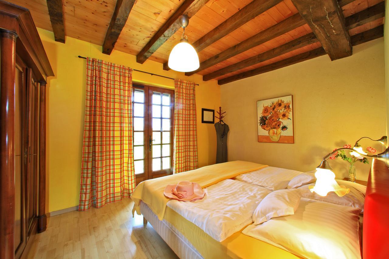 Au Jardin Fleuri Hotel Bosset Szoba fotó